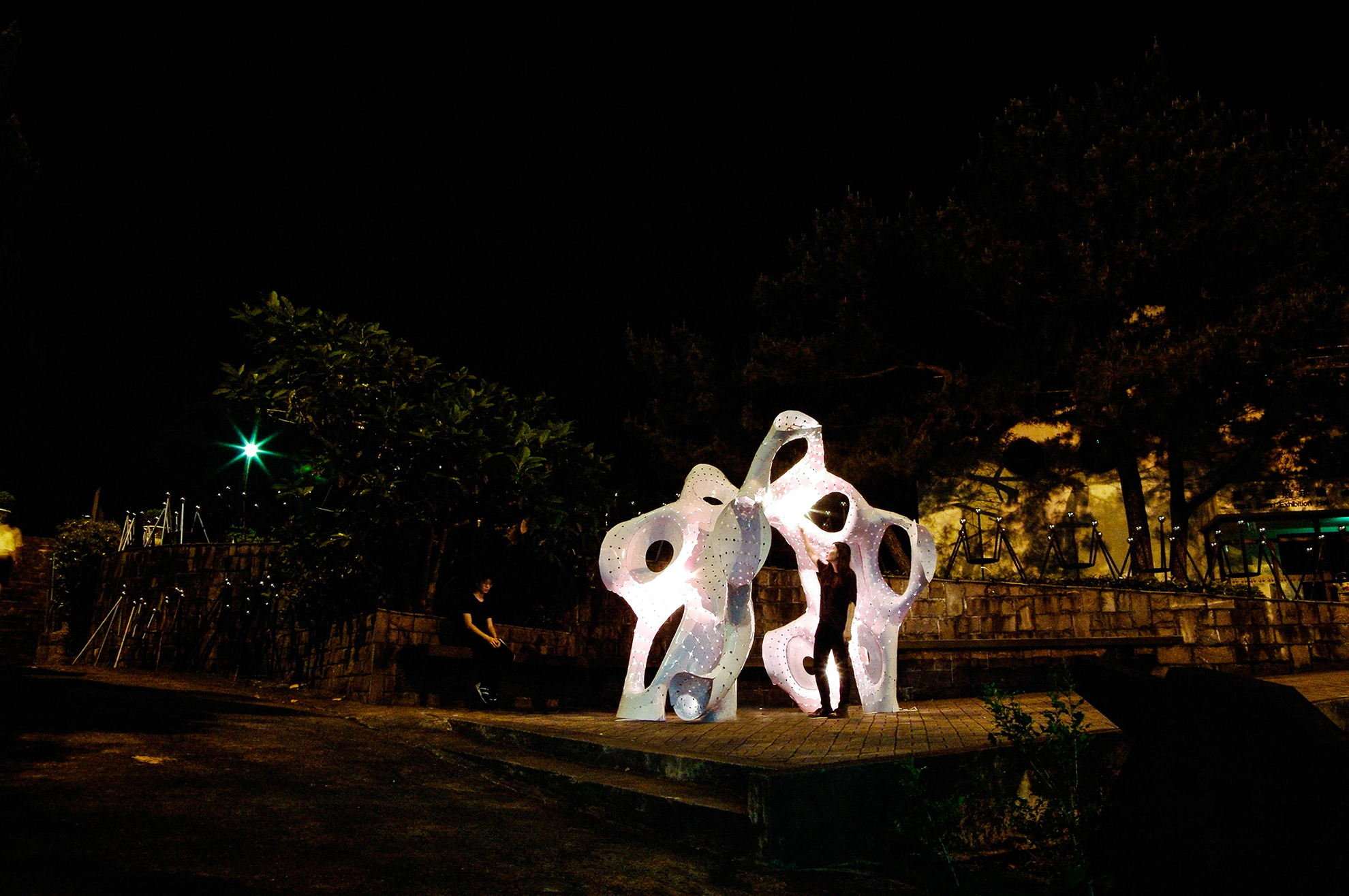 bending-active structural pavilion nightview